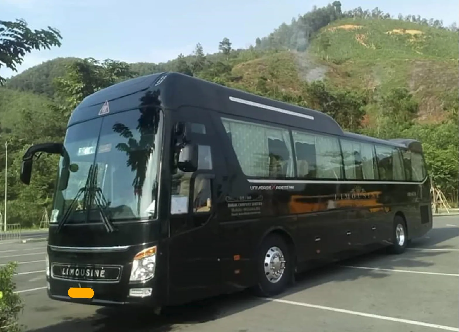vietnamtour Family enjoying a private limo ride to Vung Tau in a comfortable Ho Chi Minh to Vung Tau car.