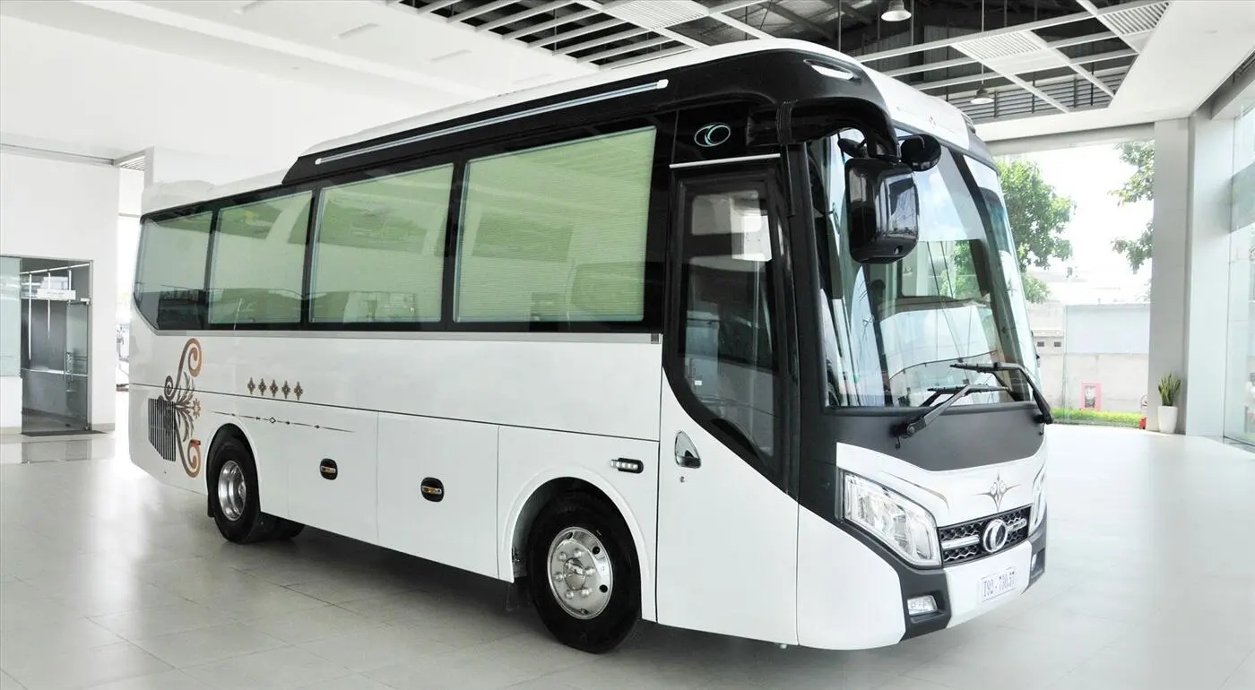 Cheap Car Rental in Vietnam a white bus parked on the side of a road